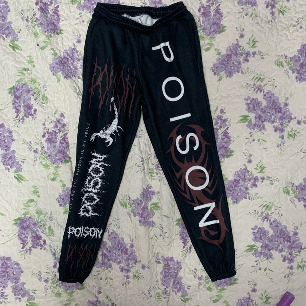 Black edgy sweatpants with comfortable inside and adjustable drawstring.